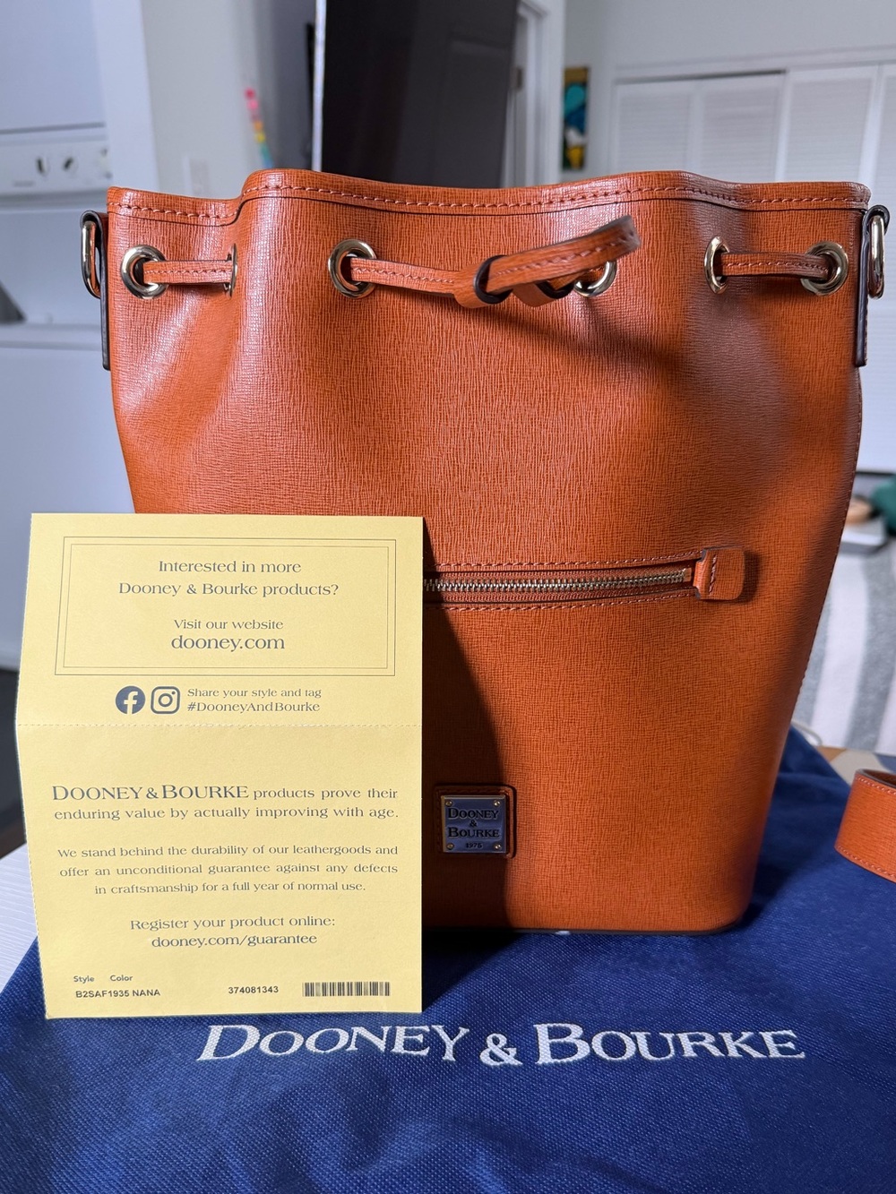 Dooney & Bourke Saffiano Leather Drawstring Bucket Bag - Natural